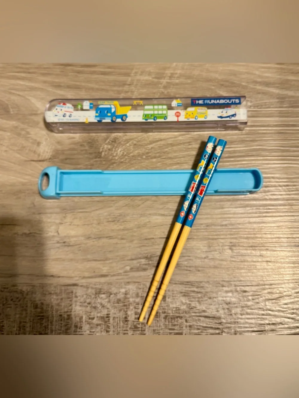 “The Runabouts” blue chopstick set. Includes children’s chopsticks and